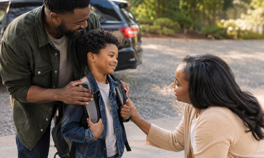 Black parent greeting child during calm handover with warm body language and natural connection Co-Parenting as a Black Parent